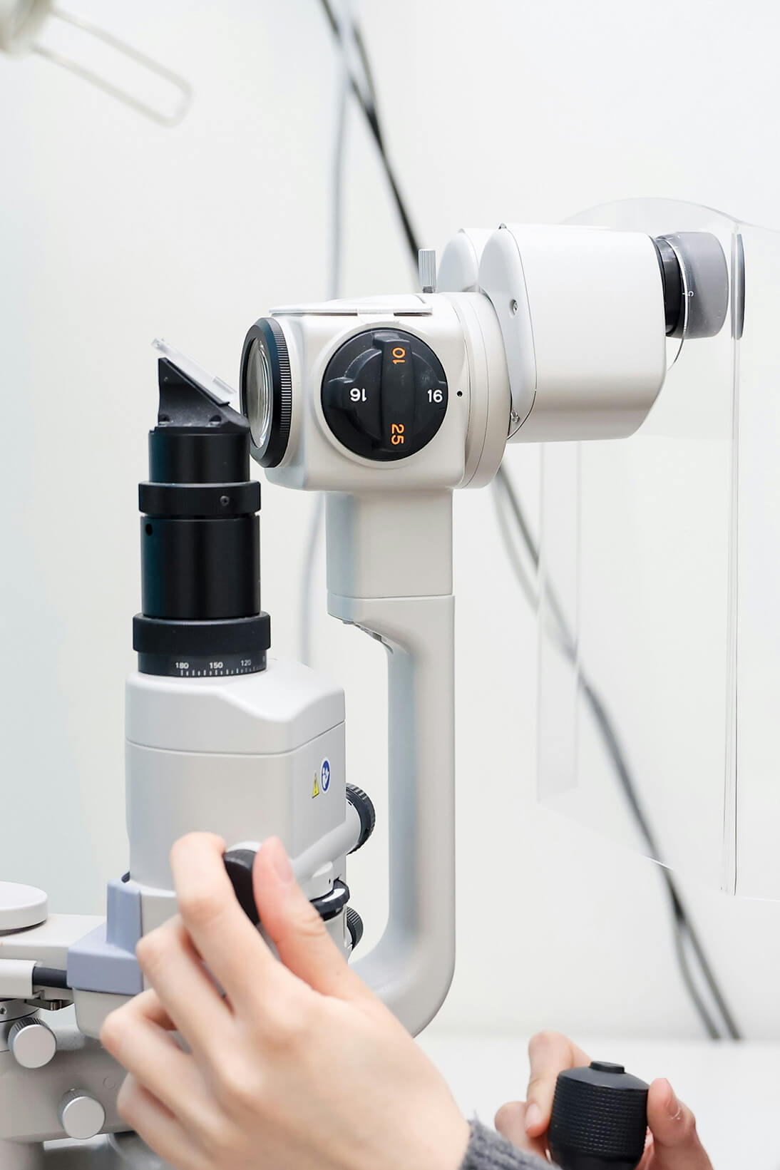 An eye doctor using eye equipment