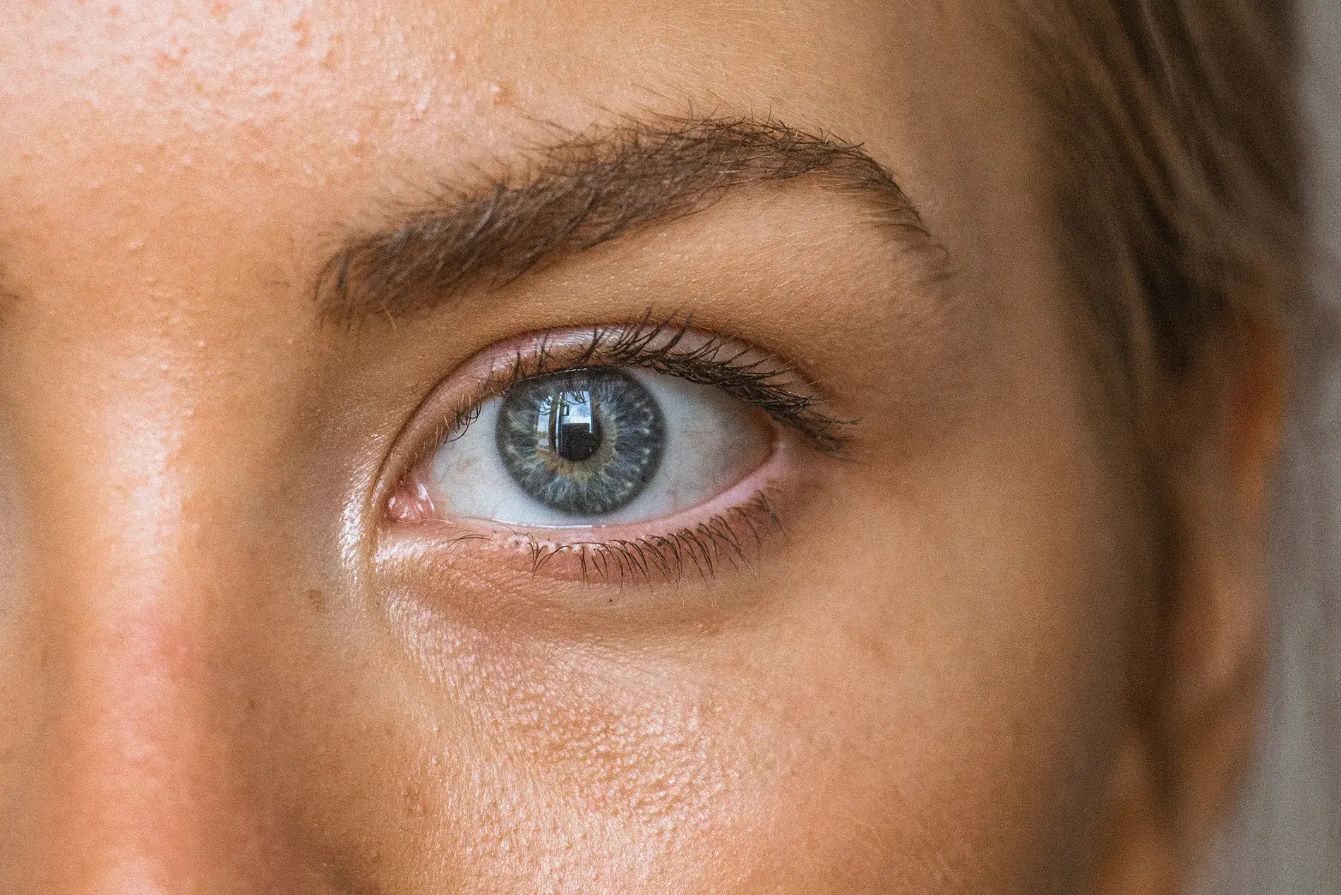 Close up of woman's gray eye