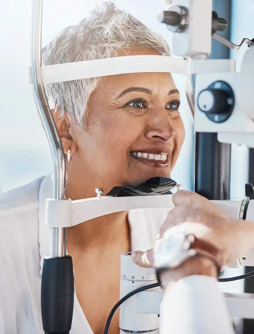 Glaucoma Service Intro Woman smiling during eye examination